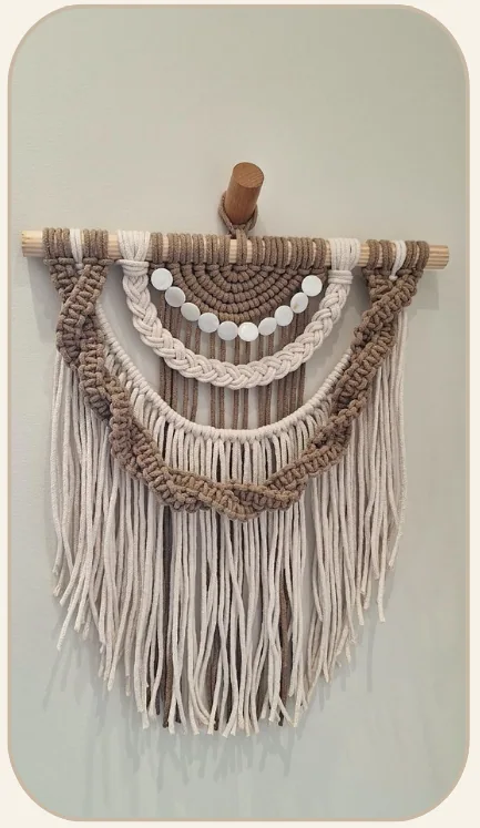 Peça artesanal de macramê